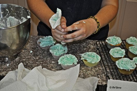 Cupcakes being assembled. Yum!