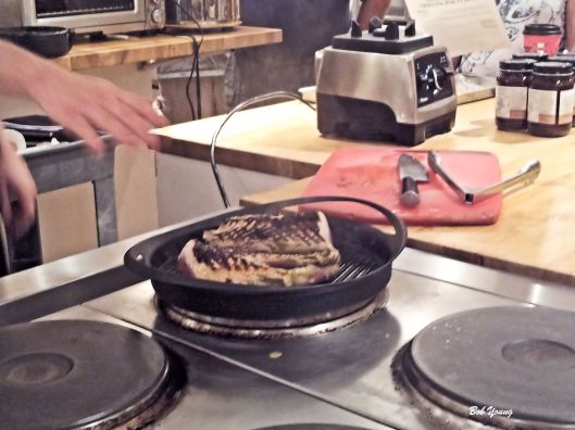 Searing the pork loin.