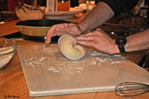 Chef Chad kneads the pizza dough.
