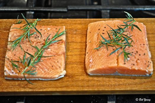 Copper River salmon on the cedar planks and ready for the grill. Salt, pepper and fresh tarragon and that's all!