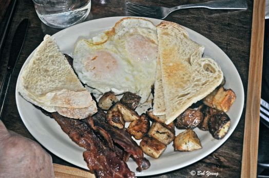 Bacon and eggs. This probably would have been good had the "toast" had more ofv a brown color to it. It was more like dried out bread. I didn't know that you had to request butter on the toast either. Not good and cost them serious points.