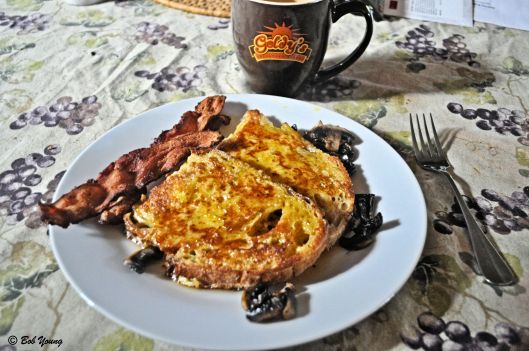 Acme Bake Shop Sourdough and Potato Bread French Toast Sauteed Mushrooms on the side Crispy Falls Brand Bacon and Coffee. An awesome breakfast.