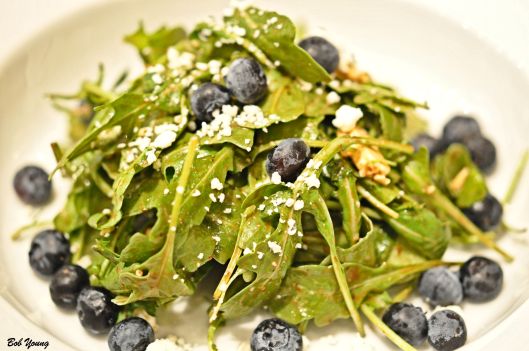 Baby Arugula Salad with Berries and Gorgonzola Gorgonzola is not one of my favorite cheeses, but the combinations in the salad worked very well with the cheese. It was suggested to add some nuts to the salad.