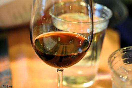 Silverware, A Menu and A Glass of Wine