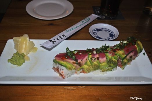 Jackie B  Spicy Tuna & Yellowtail wrapped in Avocado & seared Ahi, topped with Sriracha