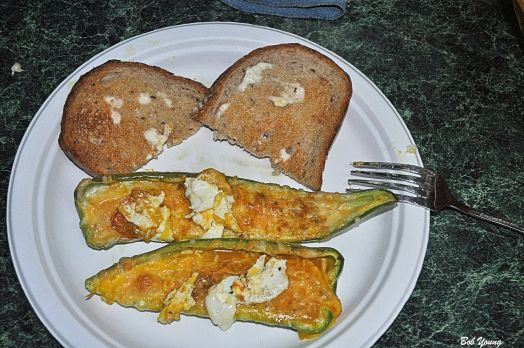 Poblano cut in half and seeds and ribs removed. Beat eggs. Spoon into chillies. Sprinkle with cheese and lightly dust with turmeric. Bake at 425 for 10 minutes or until the eggs gel. Yum!