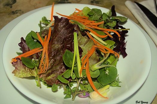 Green Salad with Miner's lettuce, slivered carrots and green onion Olave Coratina Olive Oil and Agrestum Balsamic Vinegar Dressing