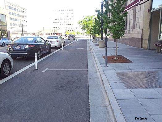 Protected bike lane in downtown Boise. I do like them very much!