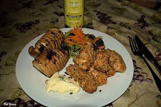 Housemade Salmon Fish Sticks Special Dipping Sauce Fanned Baked Sw2eet Potato with Garlic Butter Fresh Green Garden Salad wit5h Carrot Threads Full Sale LTD Lager 