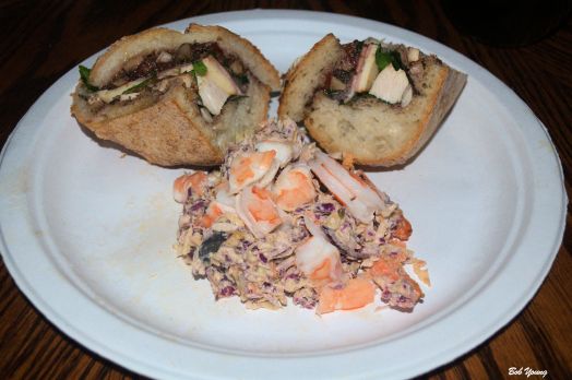 We made this variation tonight, chicken muffuletta. We used spinach, baked garlic and rosemary chicken, mortadella, thinly sliced onion and arugula.