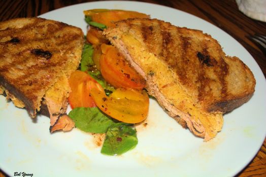 Hot Turkey Pastrami and Sqlaw on Acme Bake Shop Toasted Rye Garden Fresh Tomato and Basil Salad with Fresh Arugula