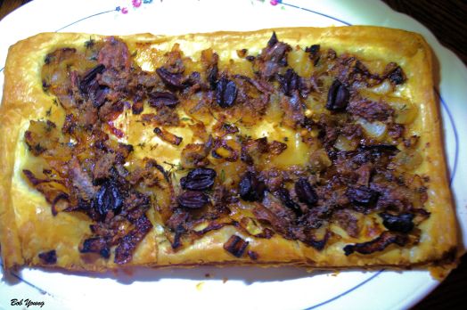 Pissaladiere Don't be frightened by the title. Here is the link to the recipe. Cheers! http://www.foodnetwork.com/recipes/pissaladiere-recipe.print.html