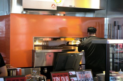 The hot oven works fine and gives the pizza crust a unique, fire-roasted flavor. I like that, especially on a thin crust. The Baker must be aware that this process can cause the crust to go to "cracker" consistency.