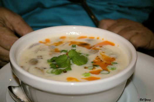 Coconut Soup (Tom Kah) Coconut milk, chicken and mushroom in lime juice and fish sauce served mildly. Bowl $3.95, Popt $8.95