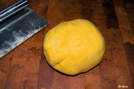 Knead it for 8 to 10 minutes by hand. When done, the dough should look very smooth and feel almost velvety.