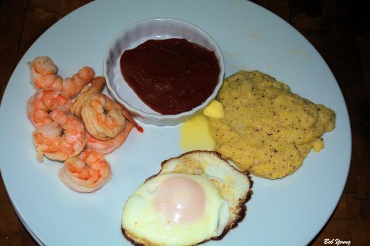 Fried Meadowlark Farms Eggs, Shrimp with Housemade Tartar Sauce and Idaho Grits A very good breakfast!