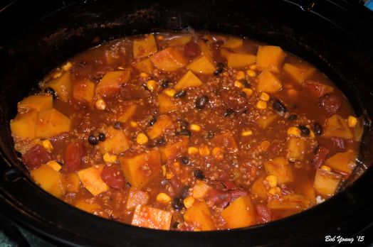 The chili is in the crock pot getting "happy".
