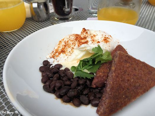 Moroccan Black Beans and Poached Eggs Organic Idaho black beans, Earthly Delights Farm heirloom Hopi blue corn polenta, preserved Meyer lemon crème fraîche, Meadowlark Farm poached eggs
