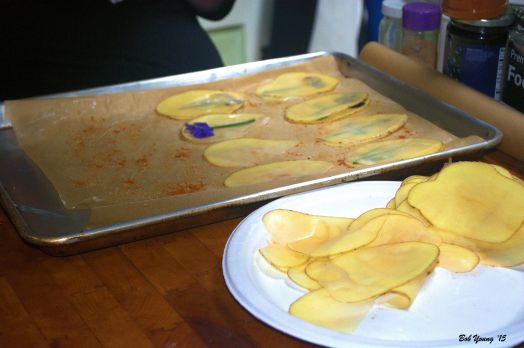 Thin sliced potatoes and "stained glass" being made.