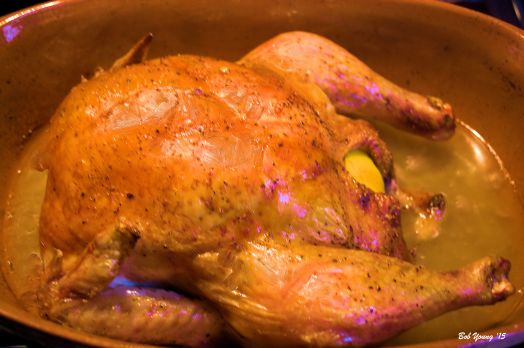 Chicken Romertopf with lemon, thyme, salt and pepper