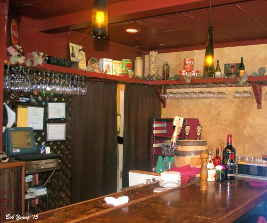 The bar area that is also a waiting area. There is a shelter outside that the over flow can congregate.