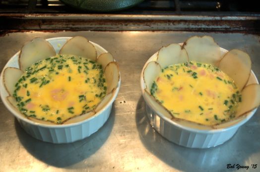 The potatoes are in the bowls and the bowls are filled.