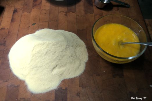 Basically four ingredients: Flour or semolina as pictured here and eggs with oil and water. You will need a clean and fairly large working area.