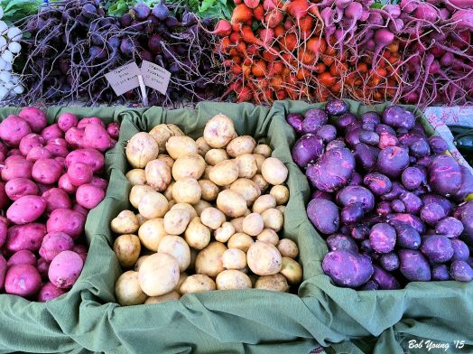 Same photo as in the header, but delightful colors and products. Love those blue potatoes. Now all we need are some orange colored spuds!