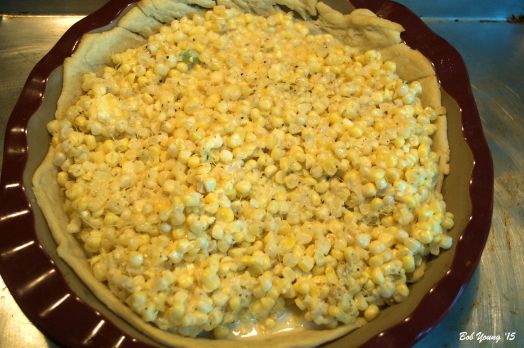 12 ears of corn off the cob. Salt and pepper to taste. About 1 cup of whole milk and about 2 Tablespoons of butter broken up. About 2 Tablespoons of flour. All mixed together in a large bowl then poured into a partial baked pie crust.