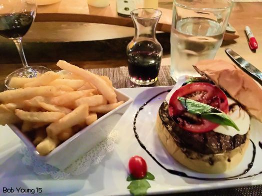 Borah Burger - Idaho Kobe beef, fresh mozzarella, basil, tomato, balsamic reduction, roasted garlic aioli, brioche bun  