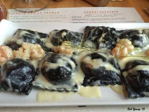 Black Ravioli... stuffed with West coast lobster & fontina, butter poached shrimp & lemon-fennel-thyme infused local Cloverleaf cream sauce