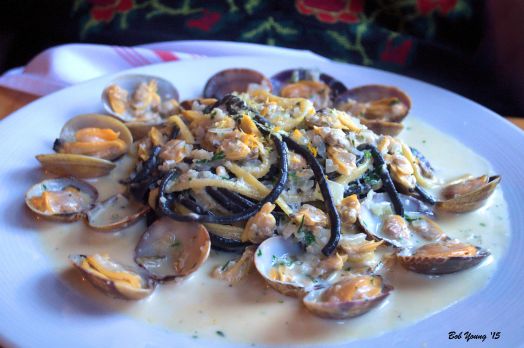 Tuxedo’ Linguine {gf}... squid ink & orange zest infused linguine, ÀLAVITA clam sauce, chili flake & Manila clams