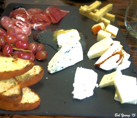 Cheese and Salami Platter smoked provolone, Boursin, dill Havarti, muenster, fresh mozzarella, warm brie and bleu cheese with dry salami and fresh baked bread