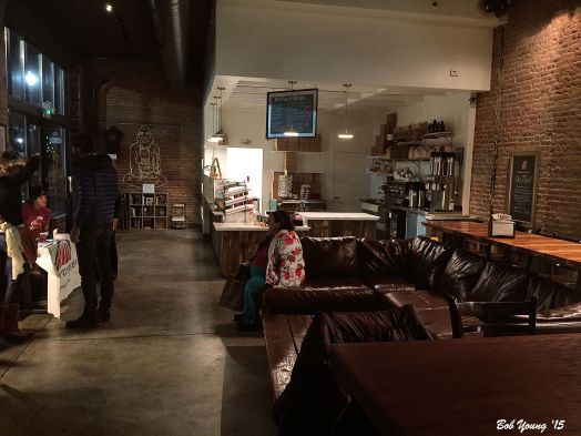 A spacious dining area. Tables and chair or couches.