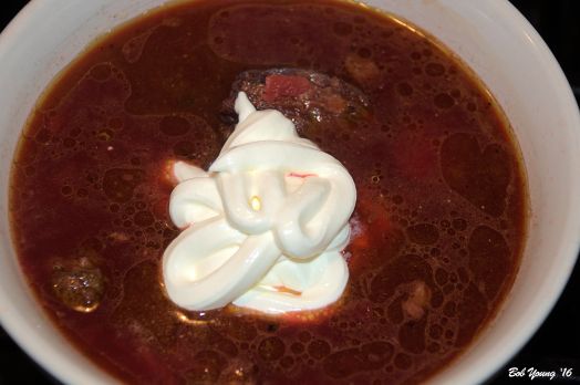 Oh my. The finished product! And as the recipe says, "Ladle the soup into bowls and garnish with the scallions, dill and a dollop of crème fraîche [or sour cream]. Serve with spicy mustard and slices of dark bread." The diced scallions and dill or fennel will really add to the flavors.