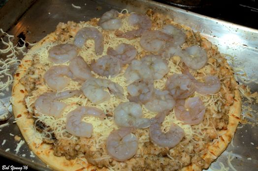 Shrimp on pizza and assembled. Ready for the oven.