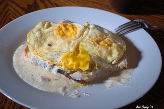 Acme Bakeshop Toasted Sourdough Imkproved Sausage Gravy Over Easy Eggs