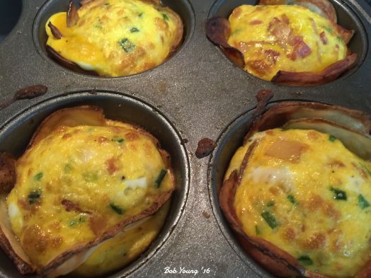 Breakfast Potato Eggs Line a muffin tin with thinly sliced potato slices. Bake off for 20 minutes at 425 degrees F until potatoes aare slightly crisp. Fill with a mixture of beaten egg, cheese, green onion, salt and pepper. Bake at 425 degrees F until eggs are set. Remove an let cool 5 minutes. I used the convection for baking these. Top with Salsa or Pico de Gallo.