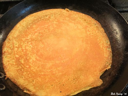 Gently flip crepe and cook for another 30 seconds. Remove from pan. Cool. Fill with the fruit filling, or anything you wish. Envelope fold to seal crepe. Place in well buttered pan and cook until slightly brown. About 2 minutes on each side at most.