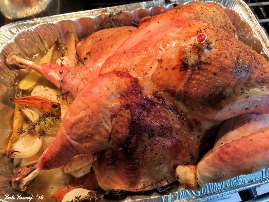 Cooking in the oven at 400 degrees F. This after 1 hour. One more hour to go for a 14 lbs turkey.