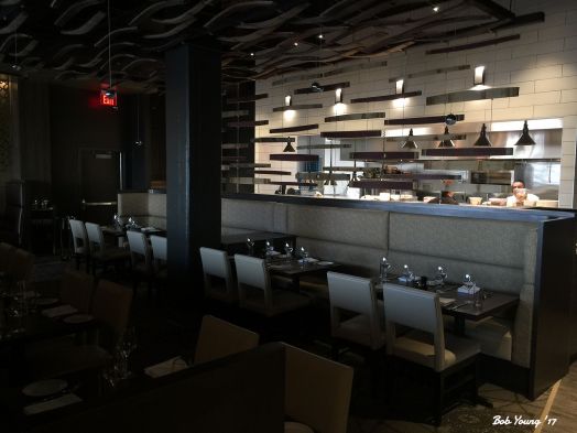  An open kitchen in the dinning area is always interesting.