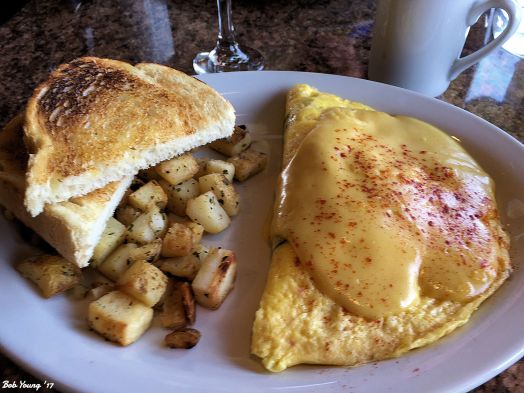 Lobster Omelet. It's the sauce that cuts this dish down.
